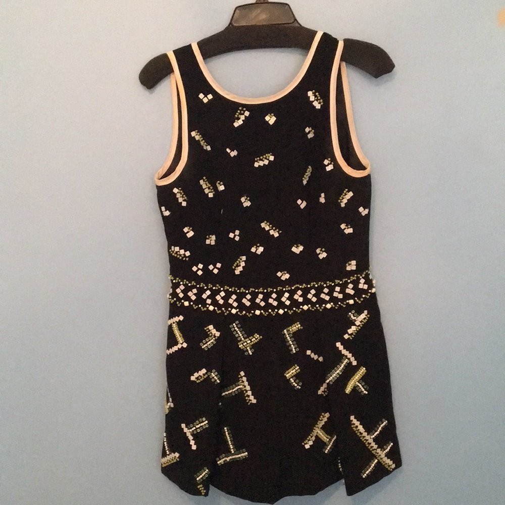 Nanette Lepore beaded romper with deep open back.